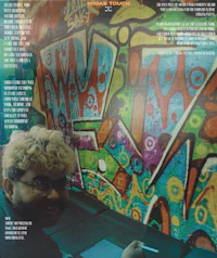 the cover of a magazine with graffiti on it